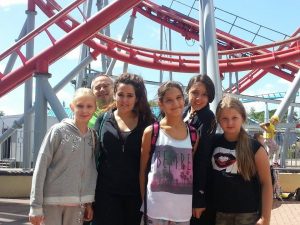 Some of the girls with teacher Gareth at Drayton Manor theme park.